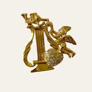 gold cherub pillar brooch